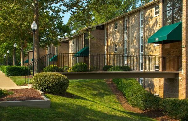 a building with a bridge in front of it