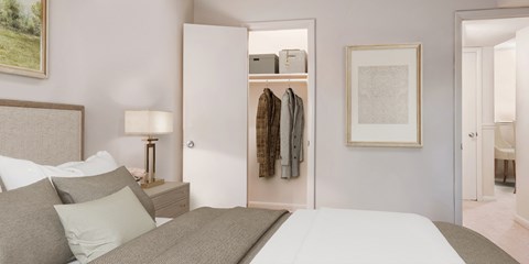 a bedroom with a bed and a closet