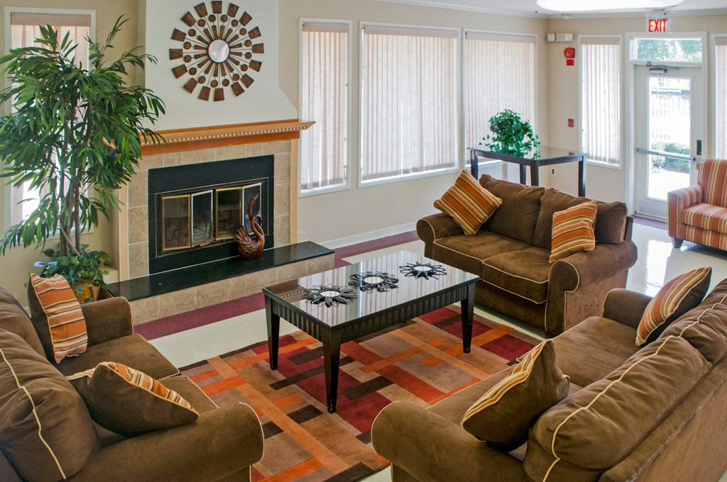 a living room with couches and a coffee table