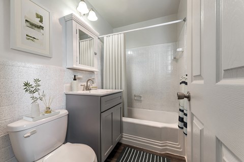 a small bathroom with a toilet and a shower