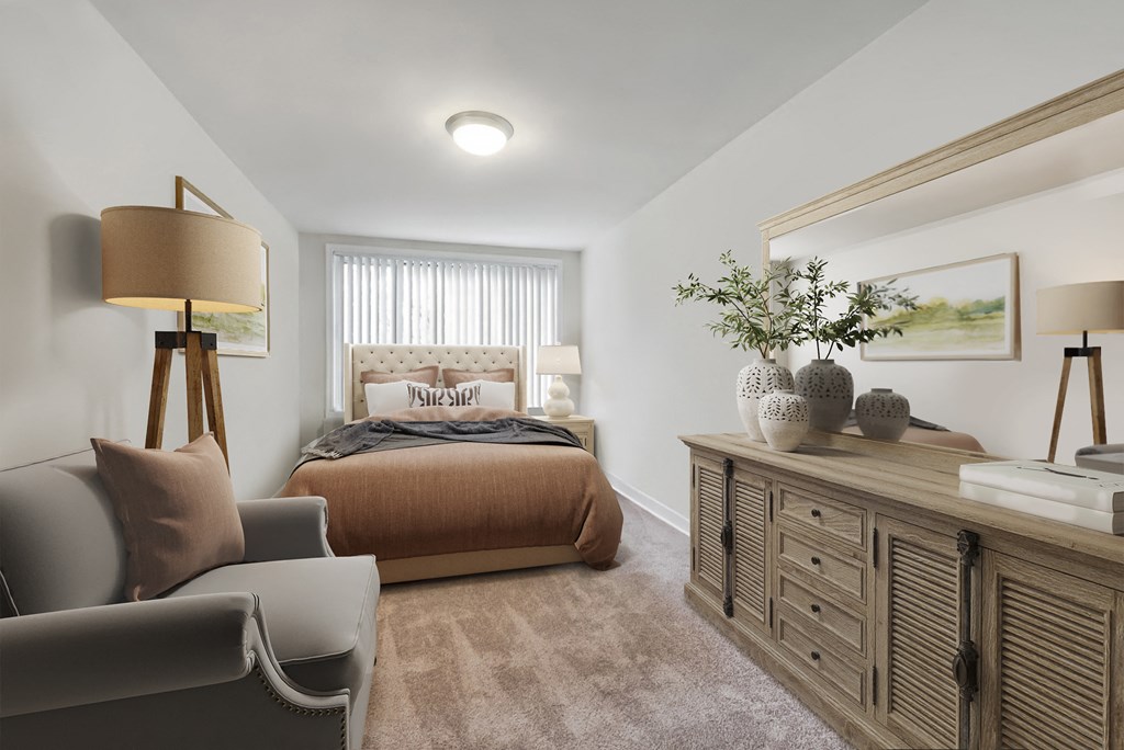 a bedroom with a bed and a dresser and a window