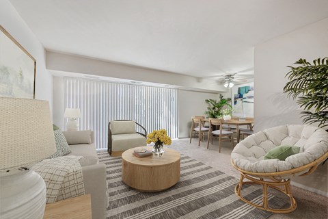 a living room with a couch and a table