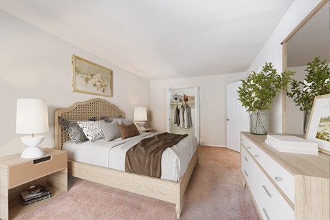 a bedroom with a bed and a dresser