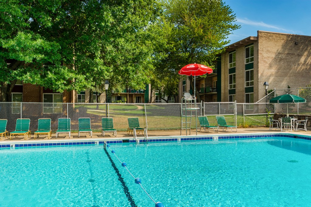 our apartments have a large pool with chairs