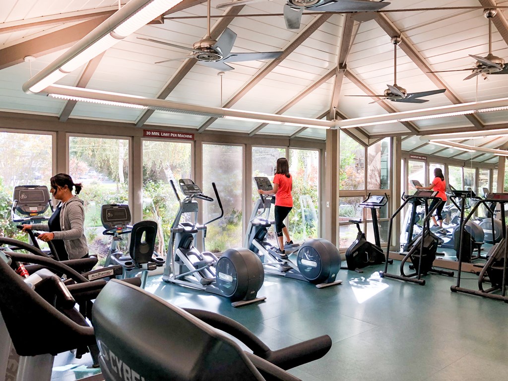 a group of women working out in a gym