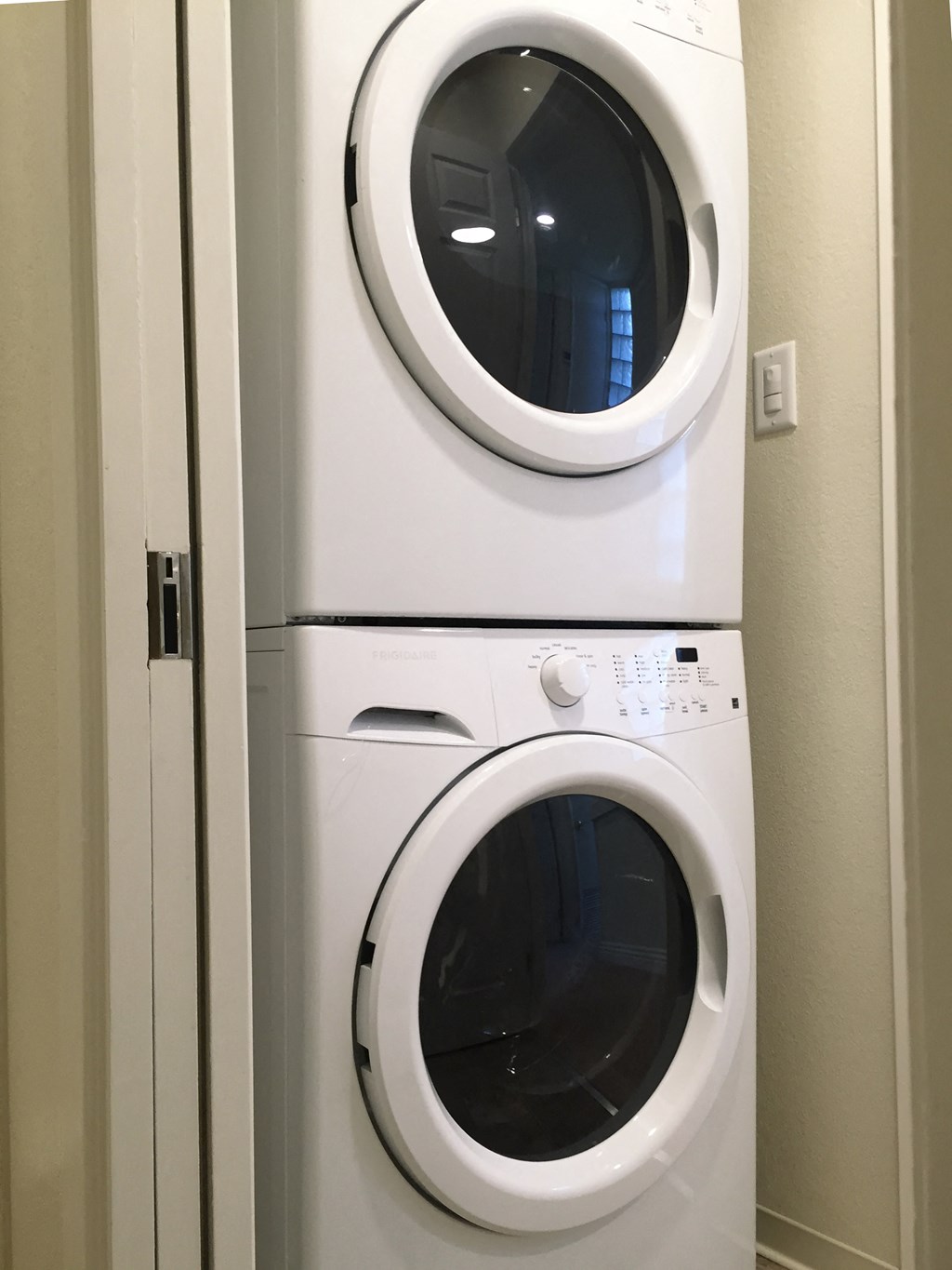 a washing machine and dryer in a laundry room