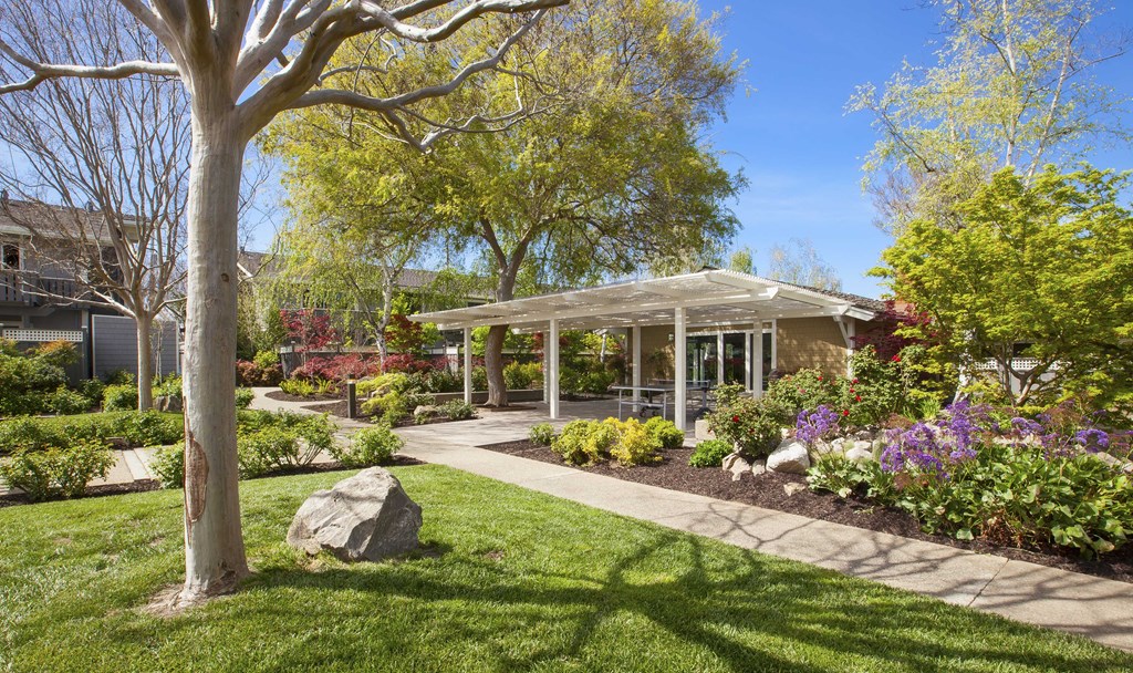 a house with a garden and a covered porch