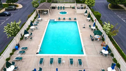 a pool is shown in the middle of a parking lot