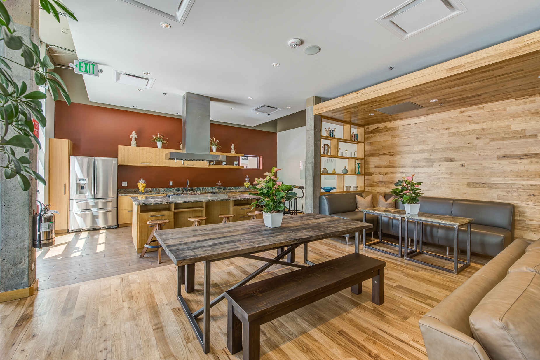 a living room with a dining room table and a kitchen