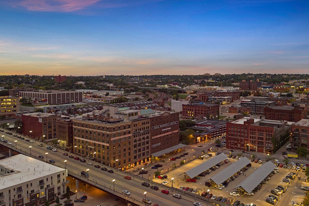 an aerial view of a city at dusk
