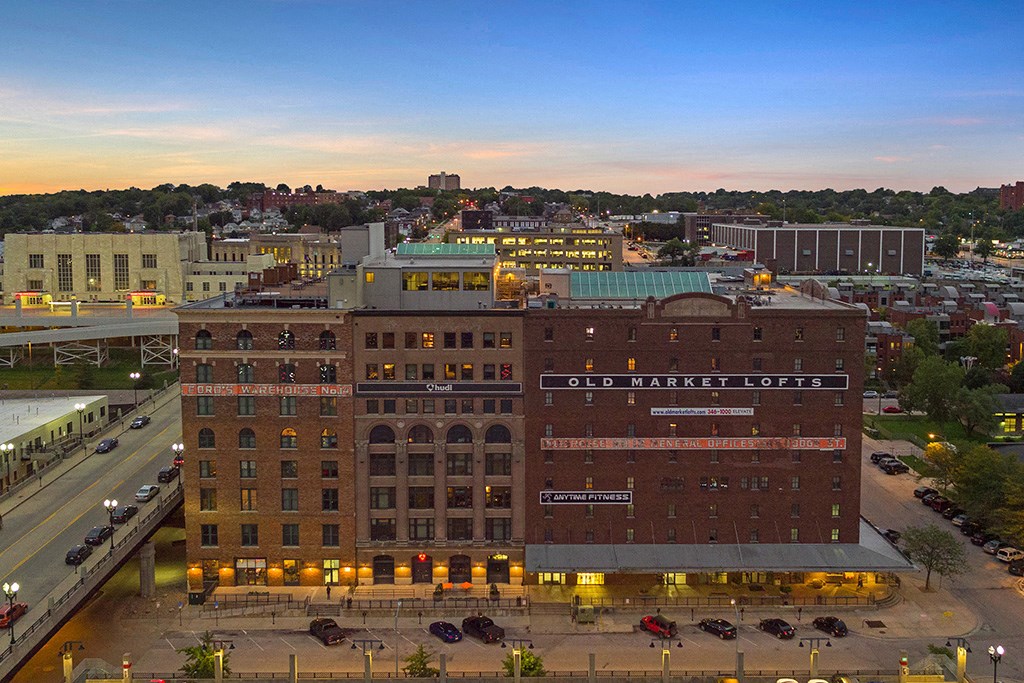an aerial view of the city at dusk