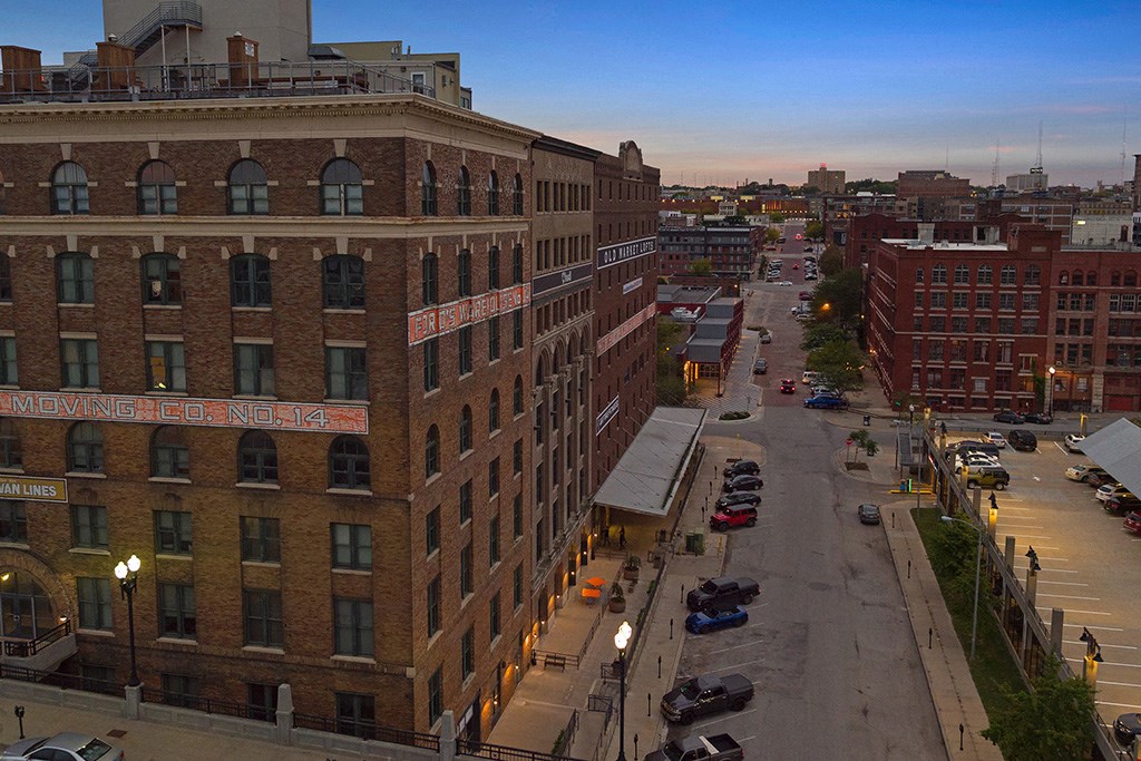 an aerial view of a city street at dusk