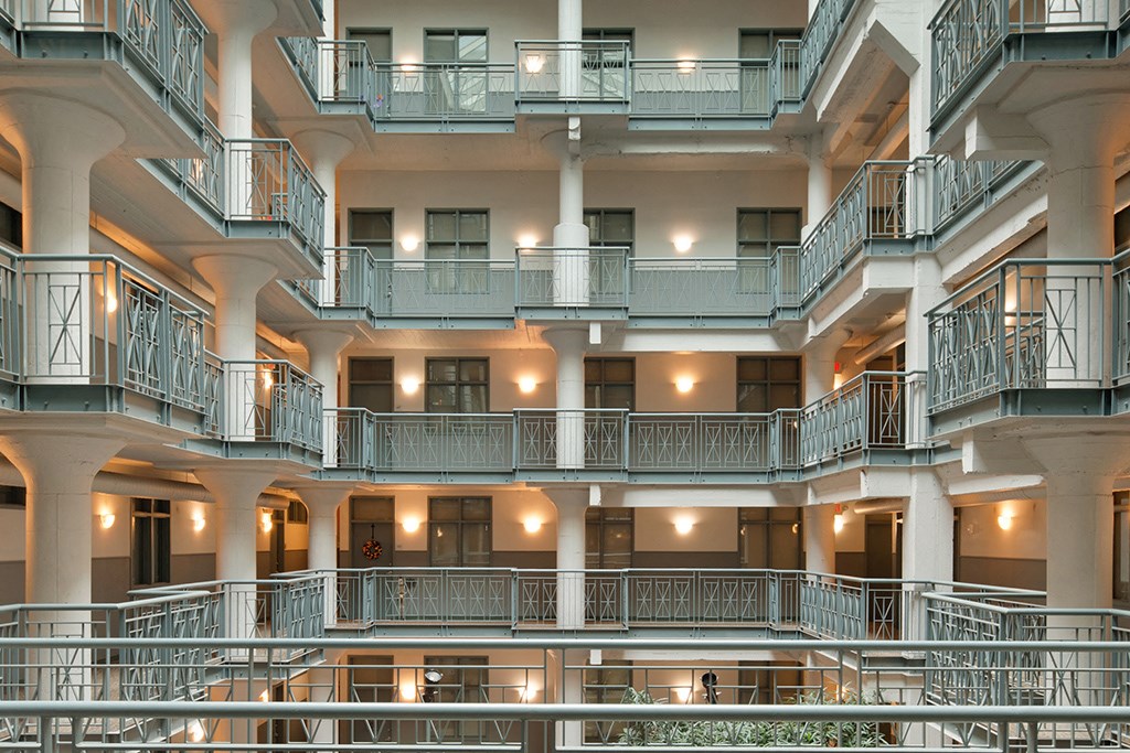 a view of the inside of an office building with balconies