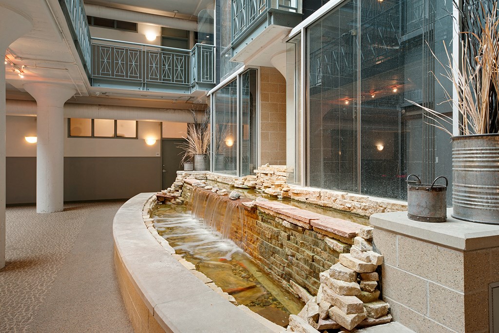 a water feature in a lobby of a building