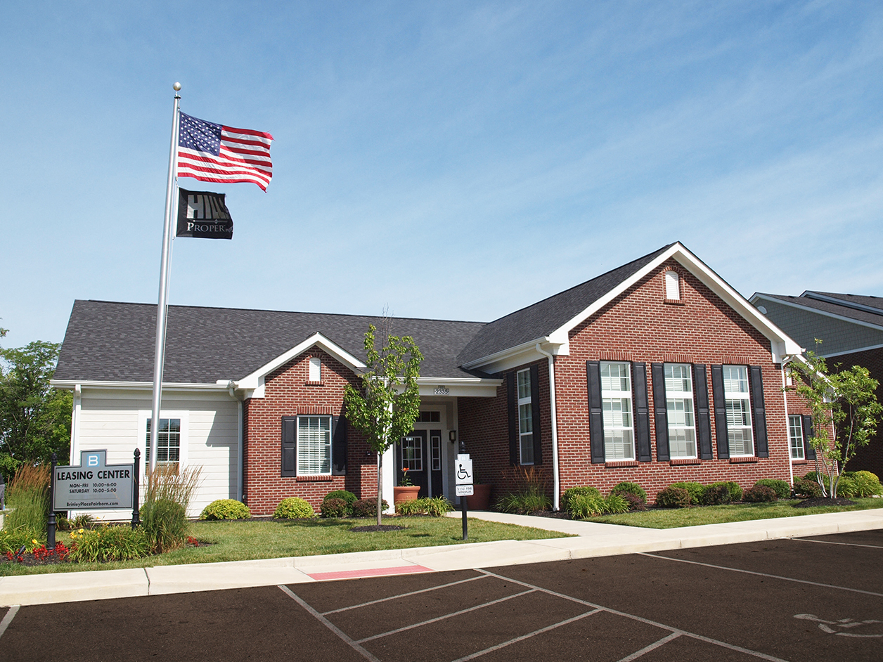 a home with an flag in front of it