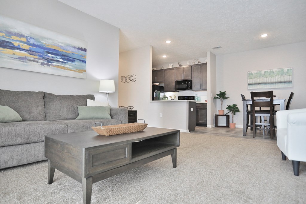 a living room with a couch and a table