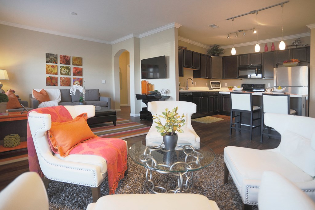 a living room and kitchen in a model home