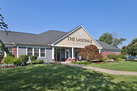 The Landings is a residential building with a front lawn.
