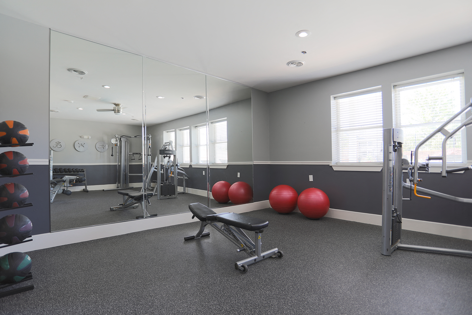 the gym at the flats at big tex apartments