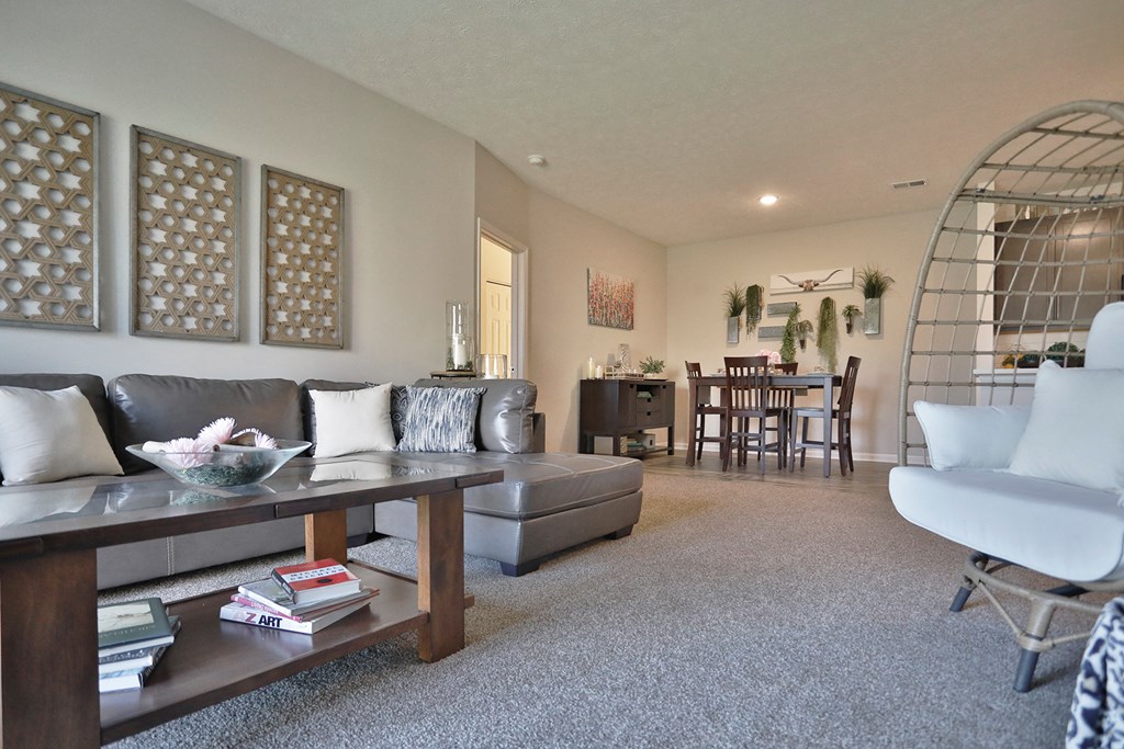 a living room with a couch and a table