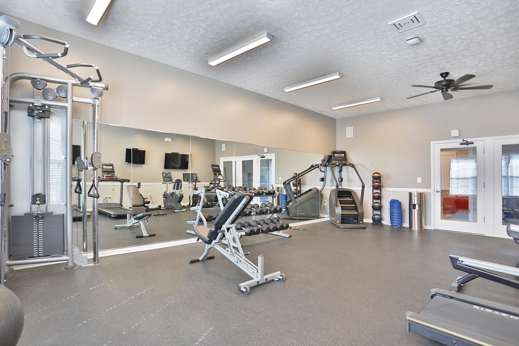 the gym at the enclave at woodbury apartments gym