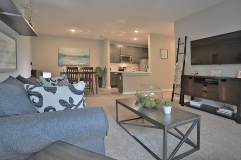 a living room with a couch and a coffee table