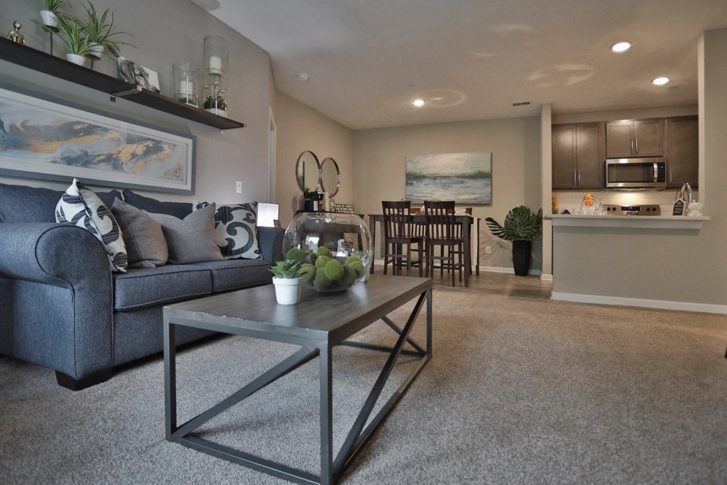 a living room with a couch and a table