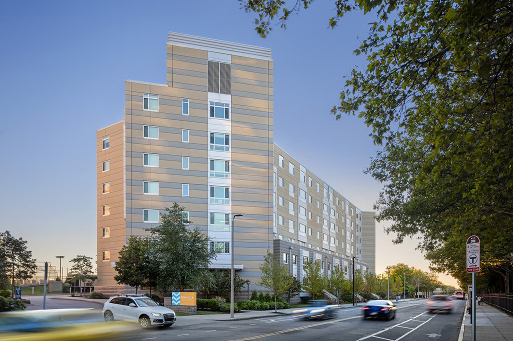 a rendering of a tall building on a city street