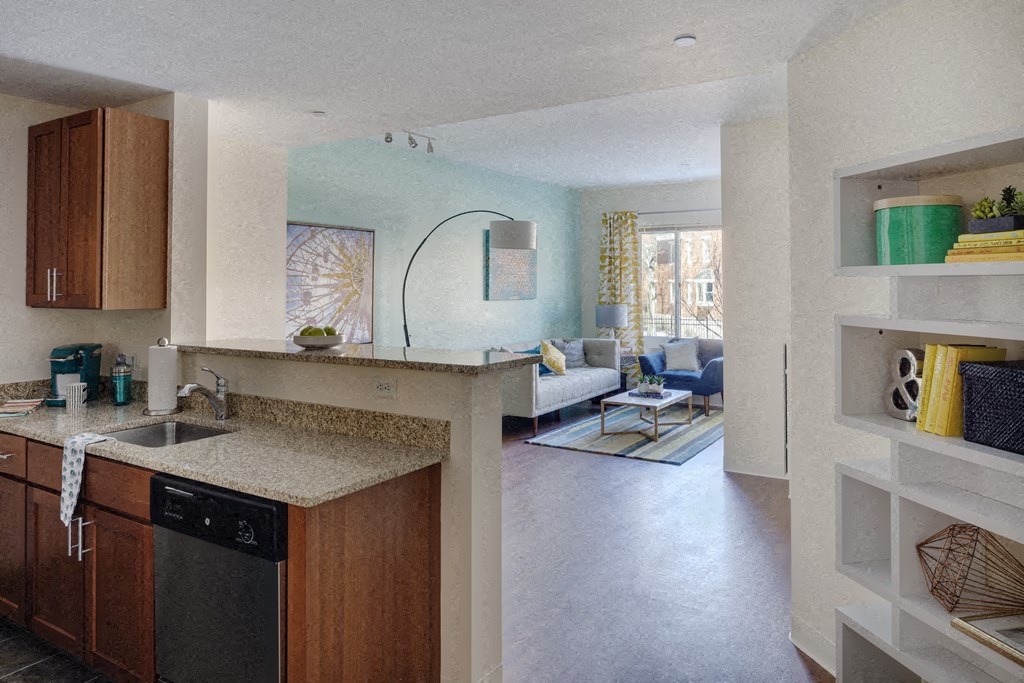 a kitchen and living room in a small apartment