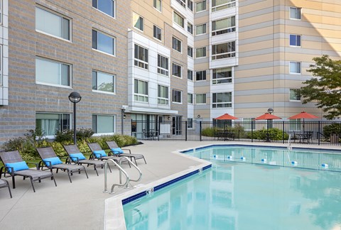 our apartments offer a swimming pool and outdoor furniture