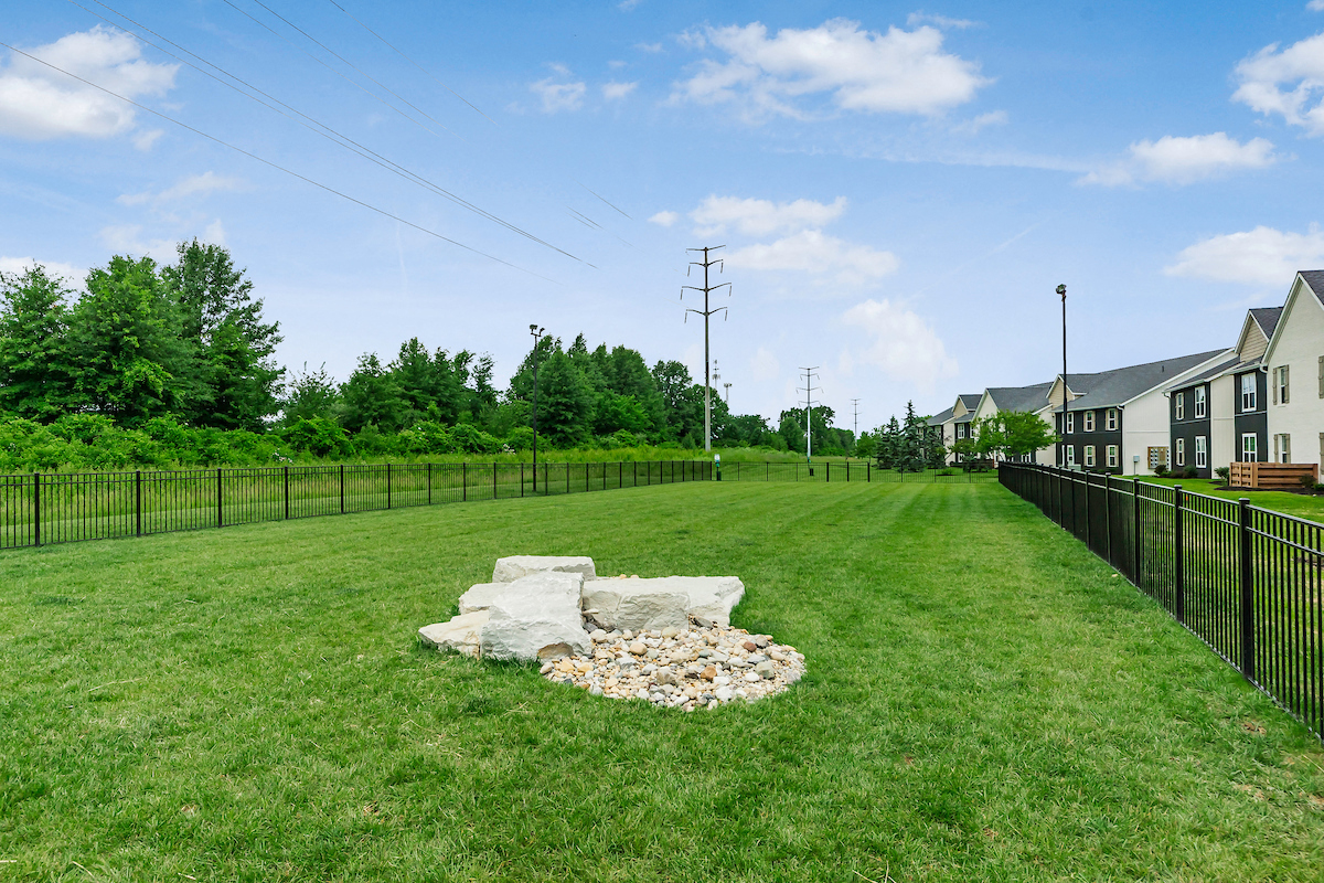 the preserve at ballantyne commons grass yard with rock in the middle