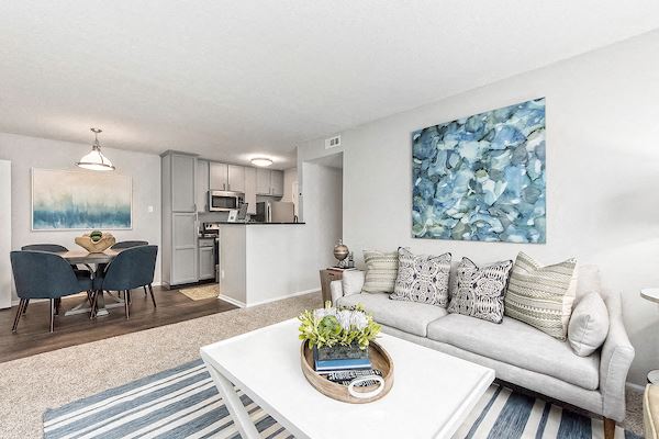 a living room with a couch and a table