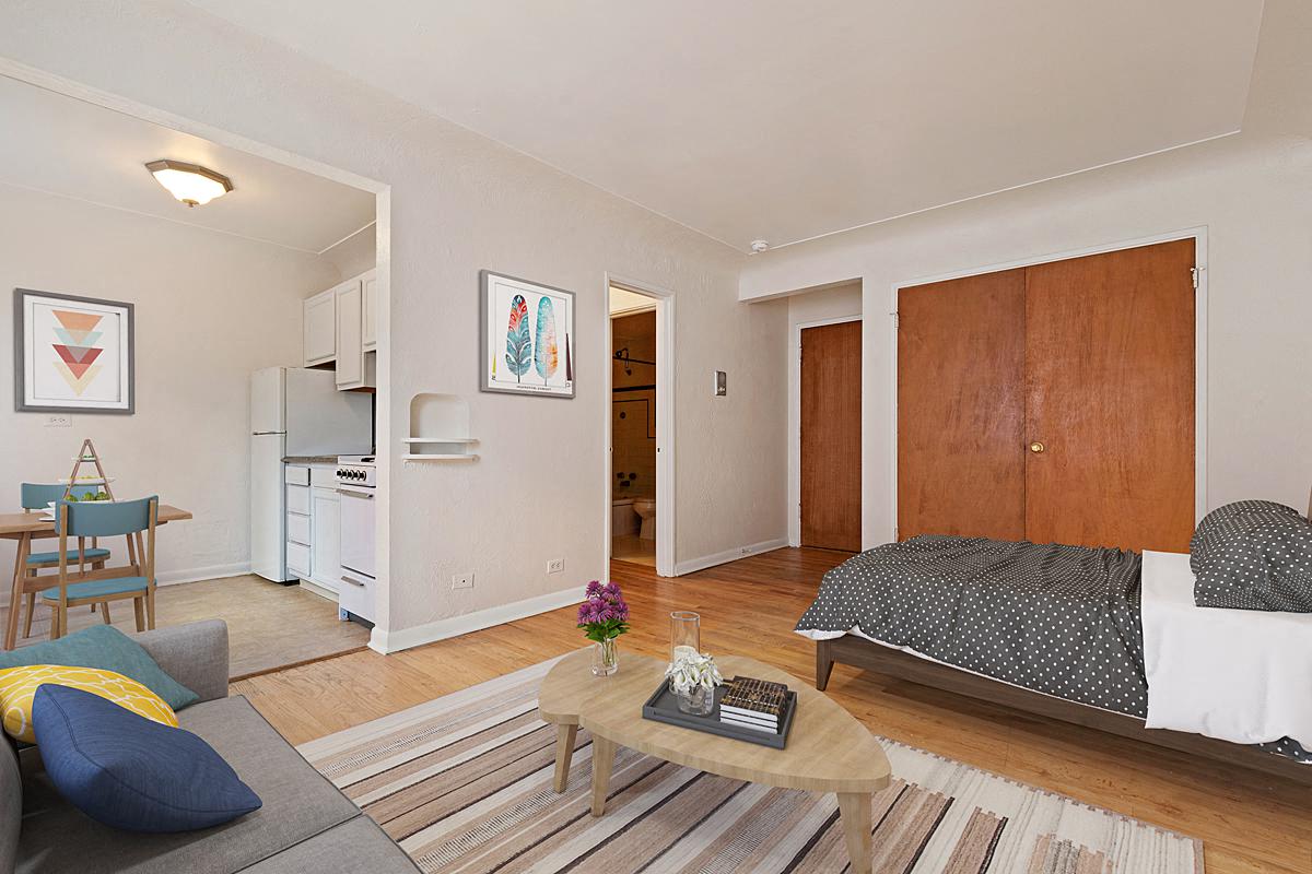 a living room with a couch and a table