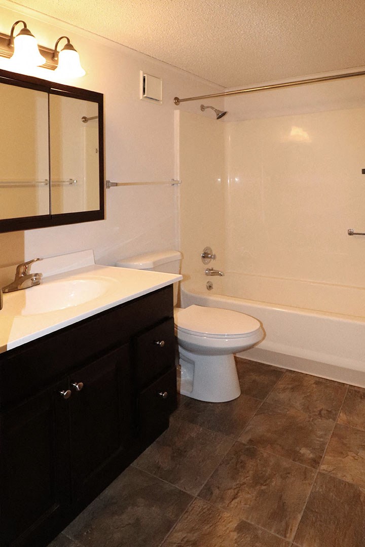 a bathroom with a toilet and a sink