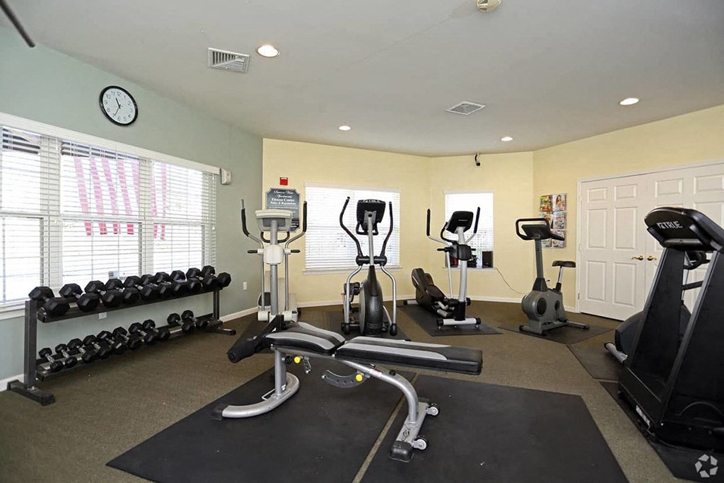 the gym at the at the boulevard apartments in