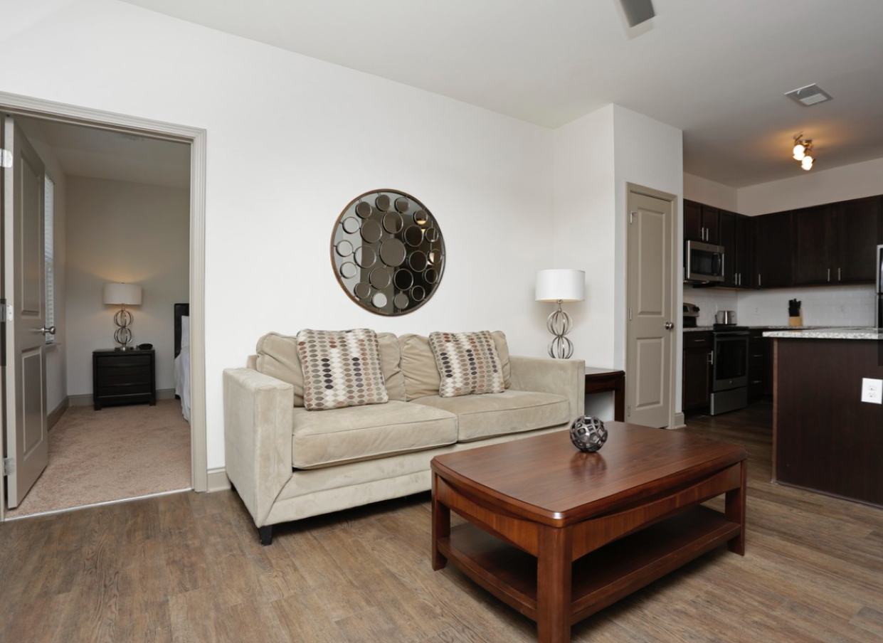 a living room with a couch and a coffee table
