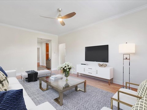 a living room with a couch and a tv