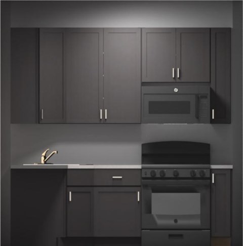 A modern kitchen with dark cabinets and a stove top oven.