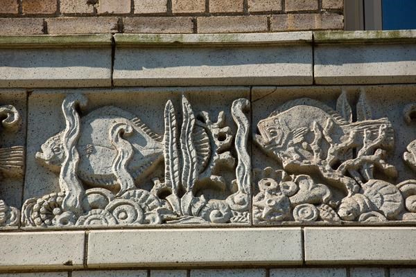 a building with a bunch of sculptures on it