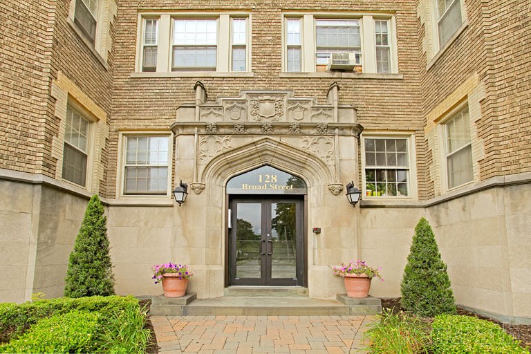 the front of a building with a glass door