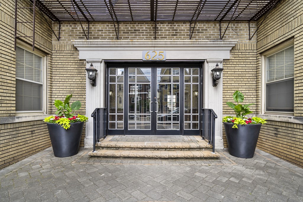 the entrance to a building with glass doors
