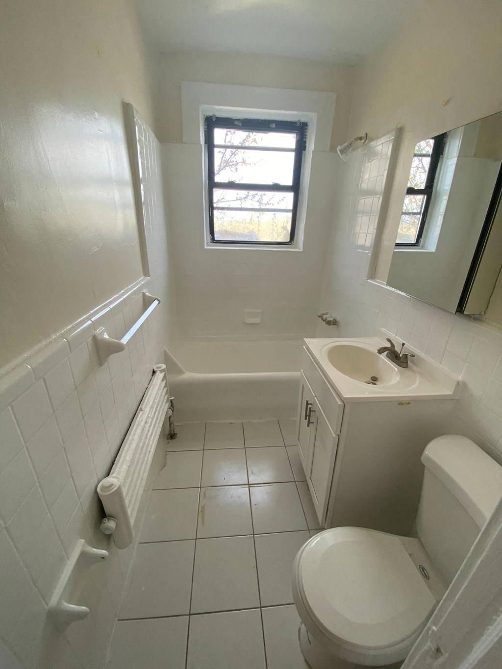 a small bathroom with a toilet and a sink