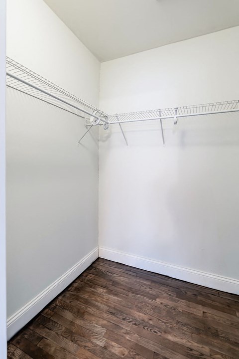 a room with white walls and a wood floor