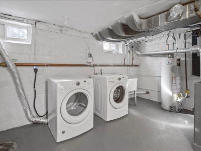 a washing machine and a dryer in a garage