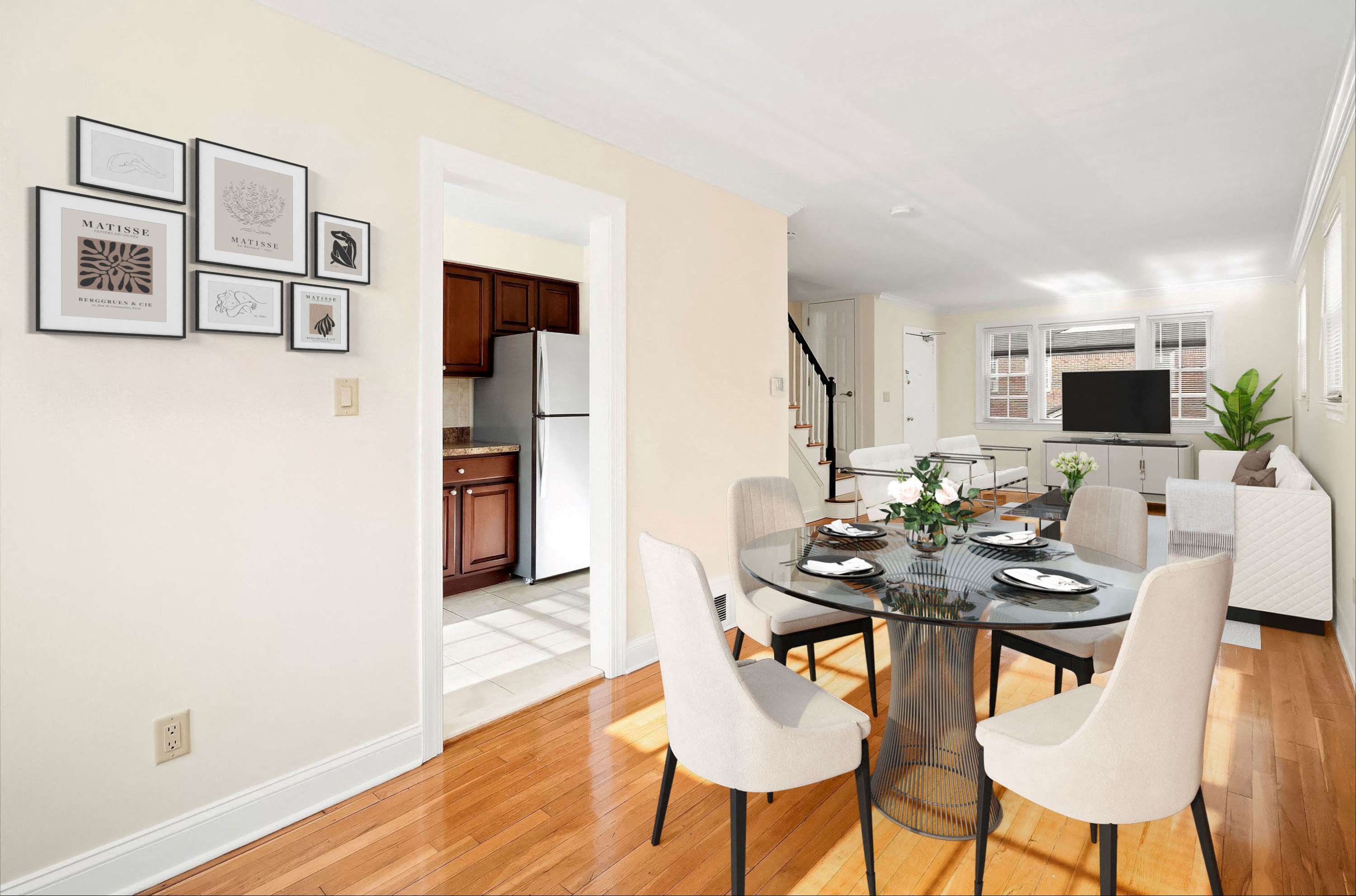 a dining room with a glass table and white chairs