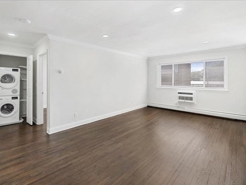 A laundry room with a washer and dryer.