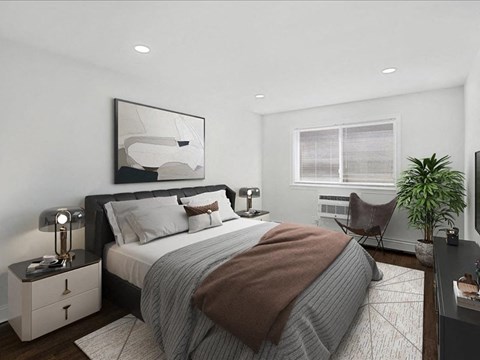 A modern bedroom with a large bed and a large mirror on the wall.
