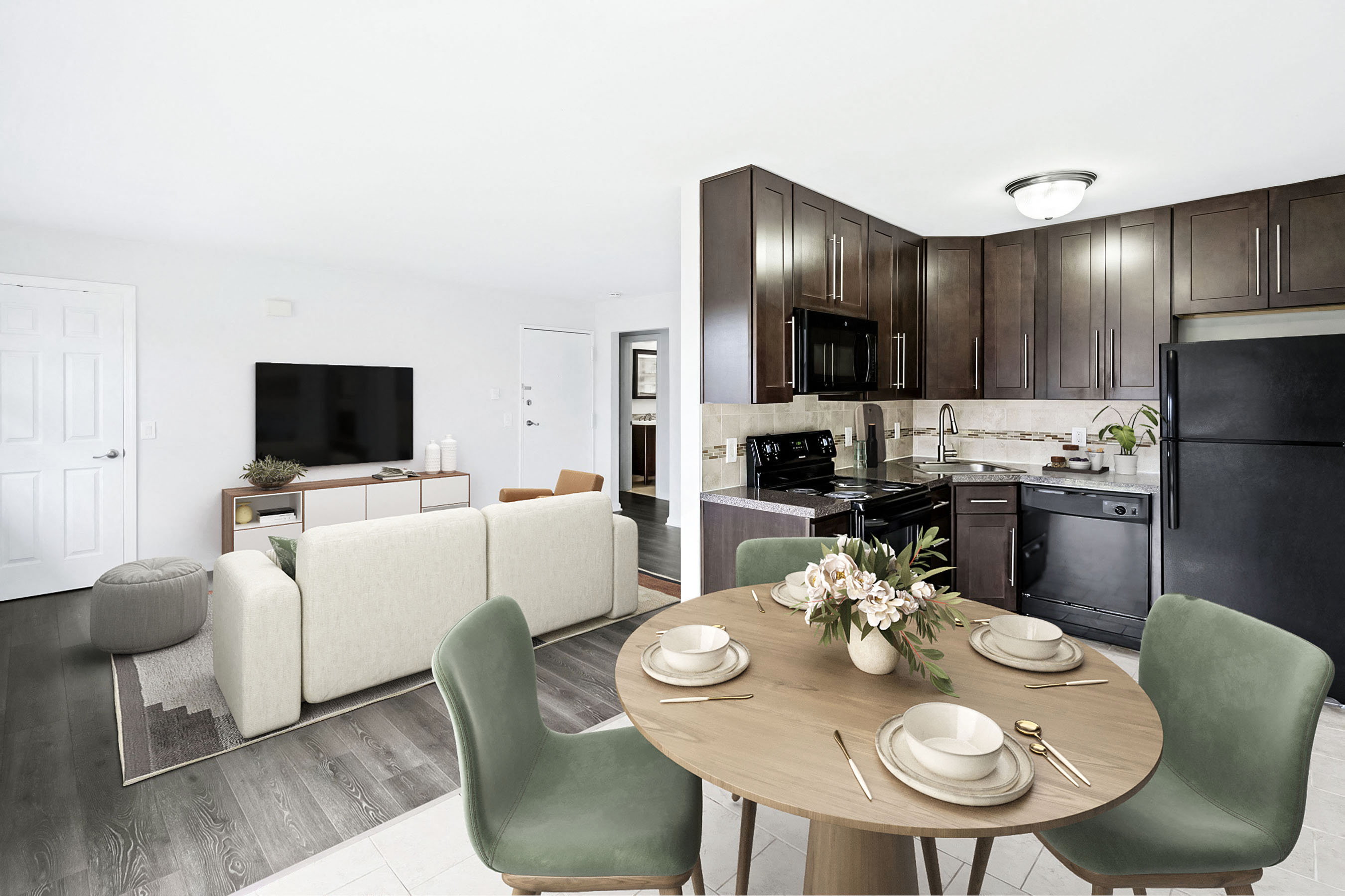 A modern kitchen with a dining table set for four.
