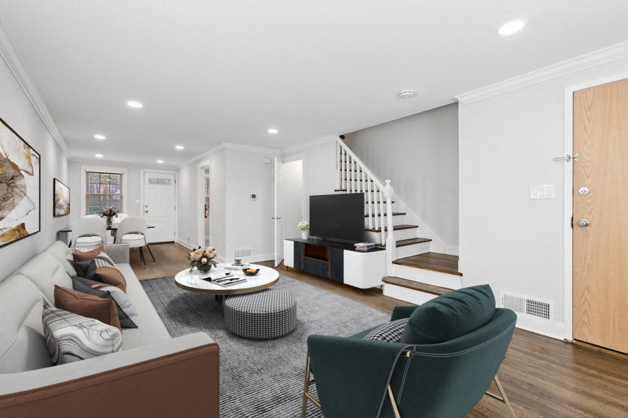 a living room with a couch and a tv