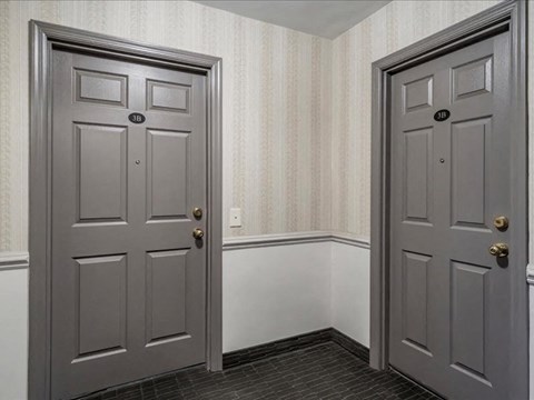 Two doors with number 18 on them.